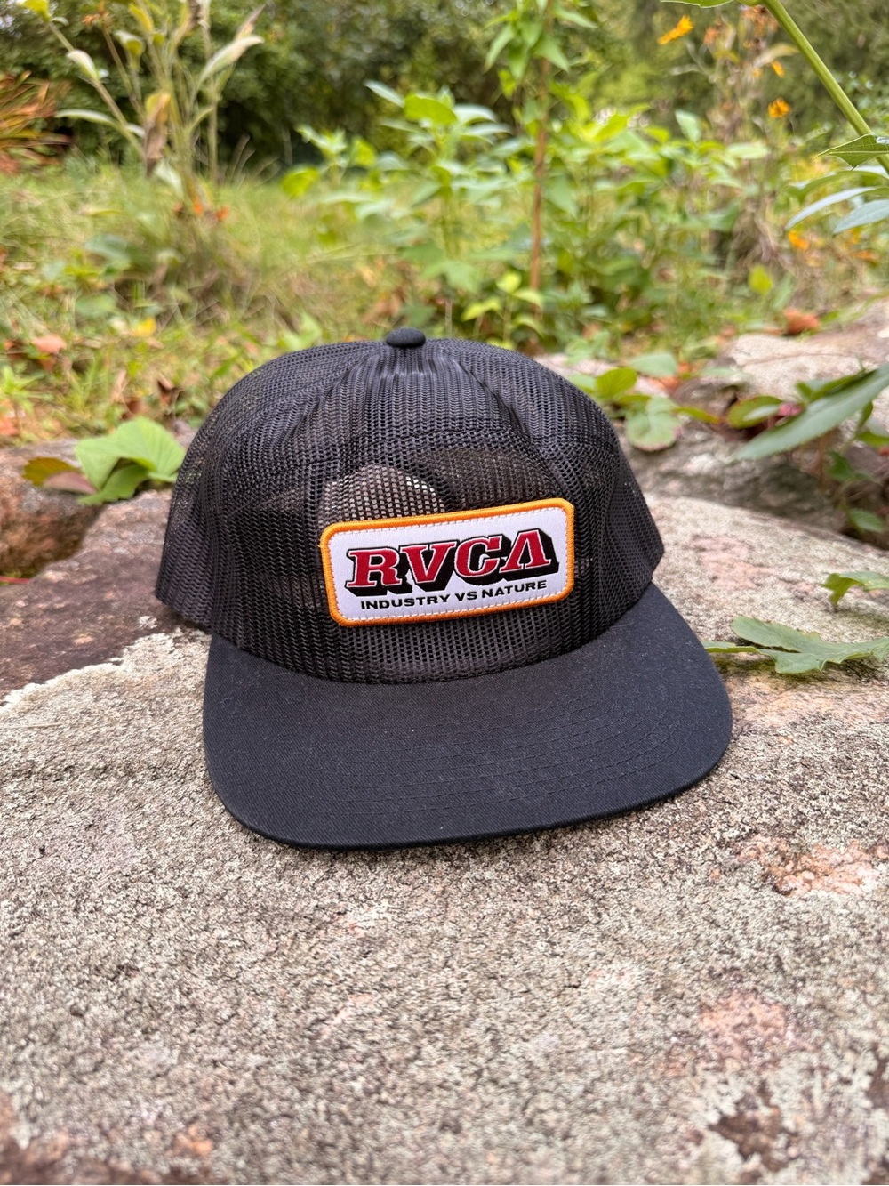 RVCA Black Mesh Trucker Hat with Red & Yellow Logo Patch